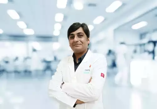 Dr Anirudh S